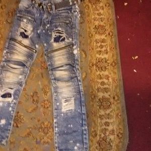 A pair of rip jeans
